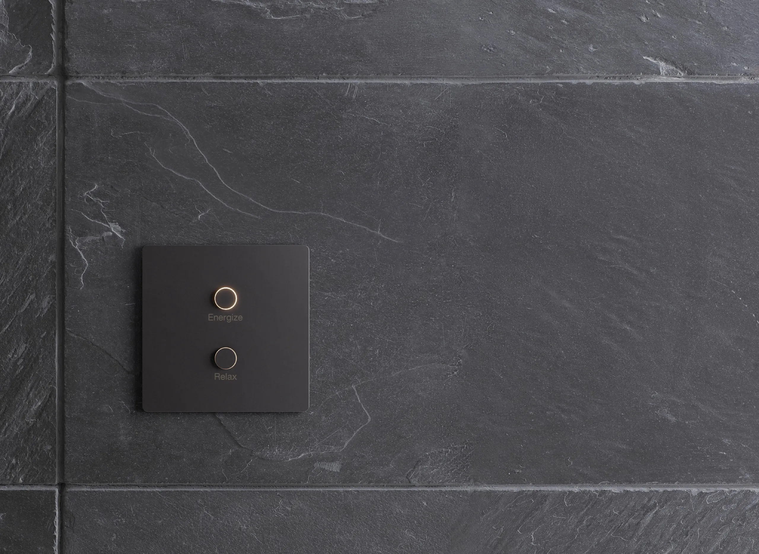 Lutron Alisse keypad with hand-finished detailing mounted on slate tile